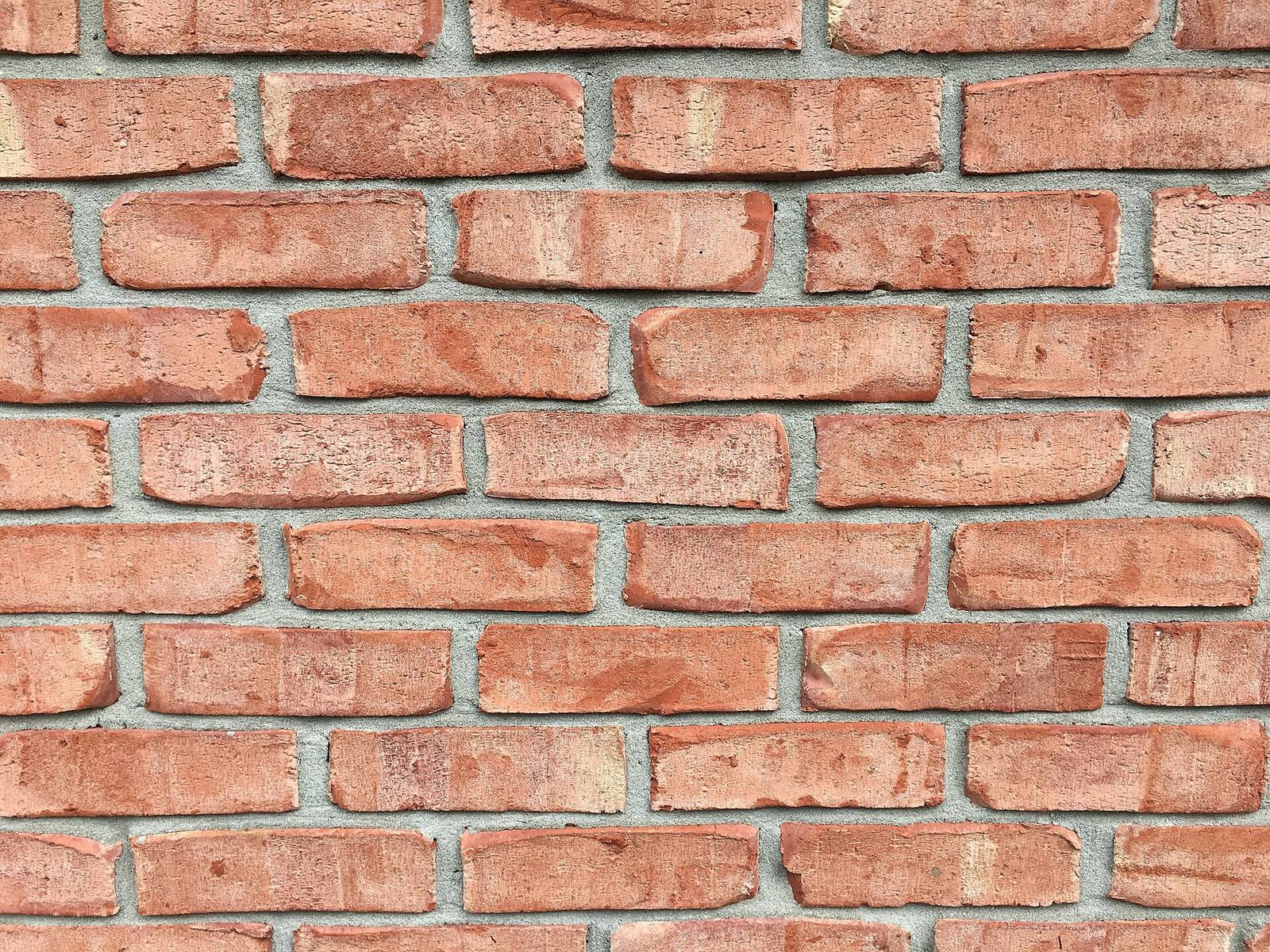 Brick wall, a human-made module whose size players read instinctively