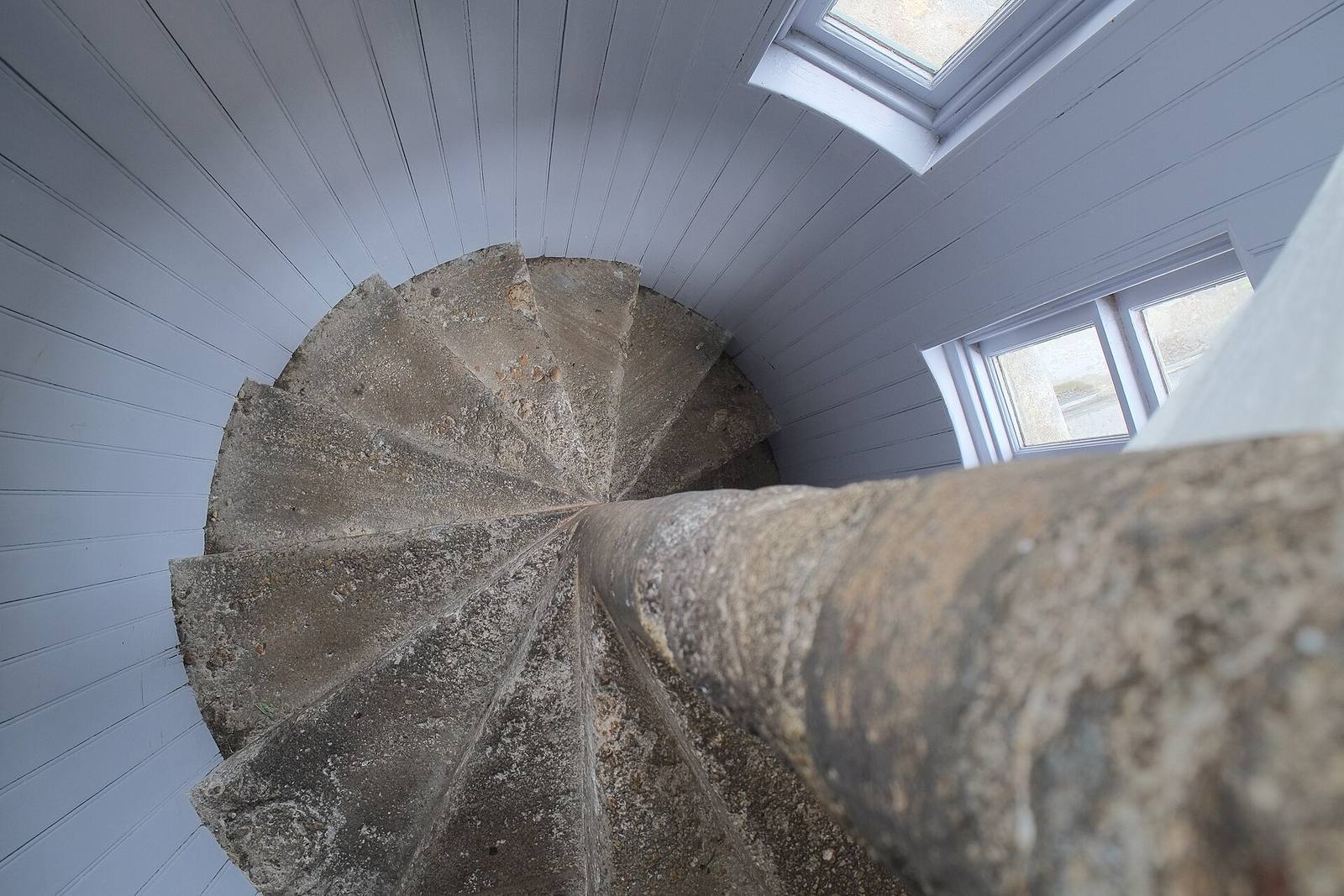 Spiral staircase inside a tower, seen from above